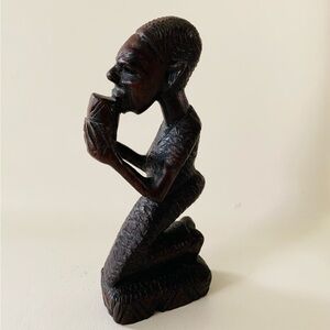 Vintage hand carved wooden African figurine